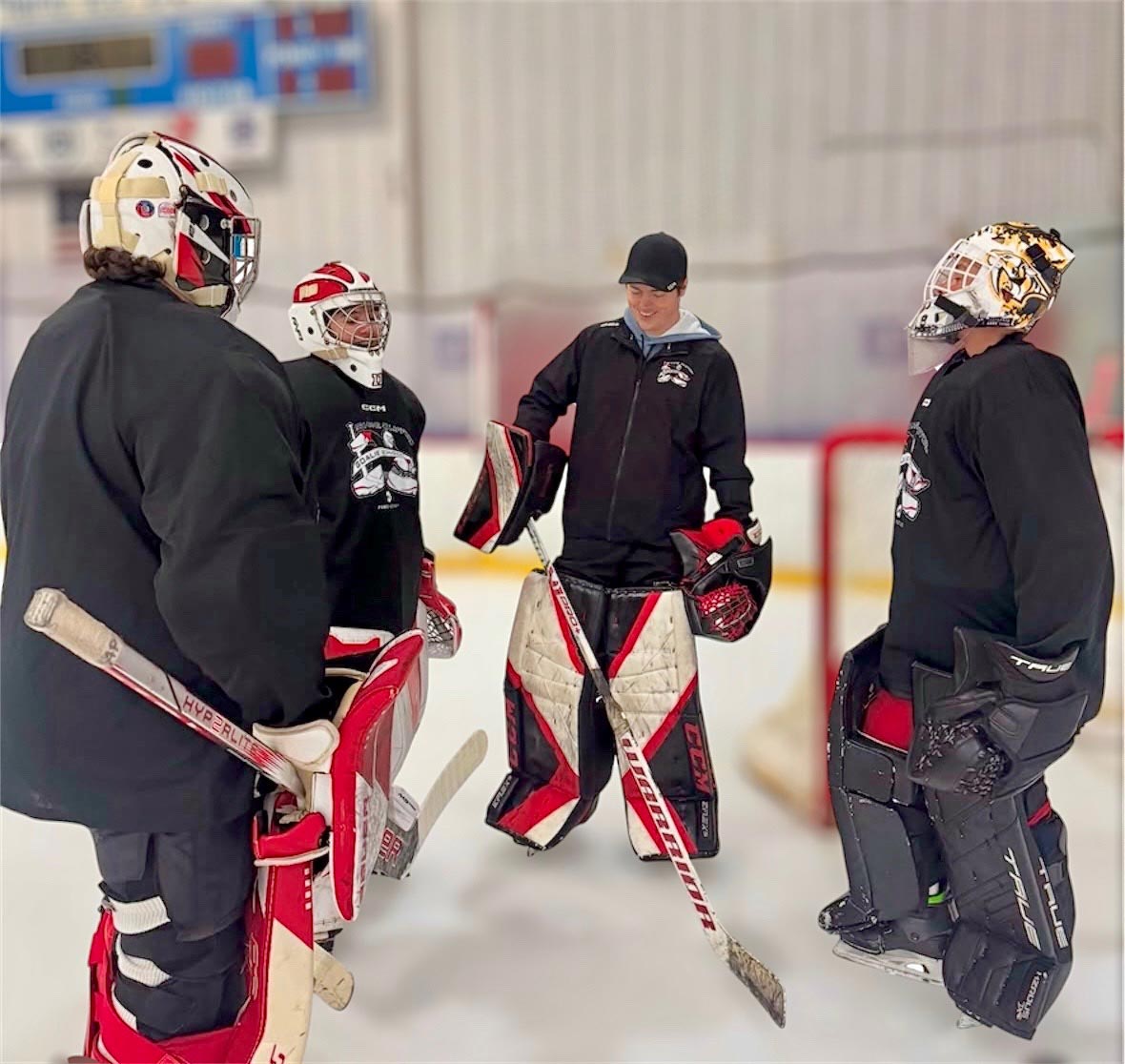 Youth hockey goalies during on-ice practice — Coach Utah summer goalie clinic series in Utah